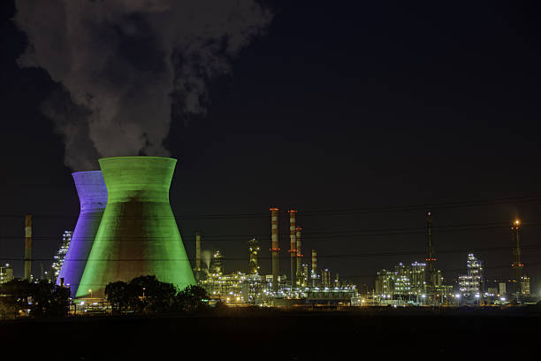 Industrial Refineries with smoke at  night in Haifa Israel HDR