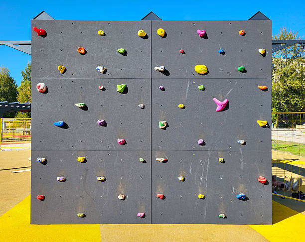 Climbing wall on the playground on a clear sunny day outside