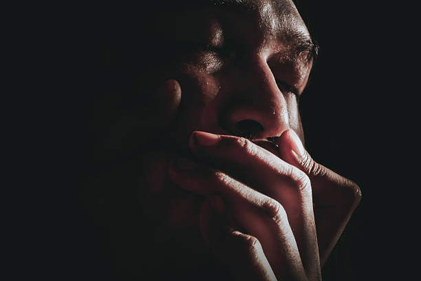 Mysterious Depressed Man in Shadow with Intense Emotional Darkness