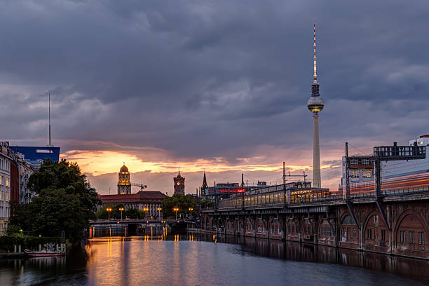 The famous Television Tower and the river Spree in Berlin after sunset