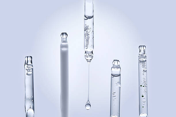 istock Five different droppers with facial serum in a row. 2218528862
