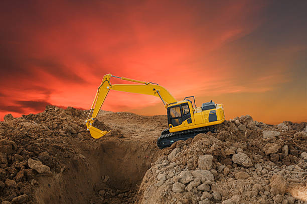 istock Excavator with Bucket are digging analyze the soil. 2218532618