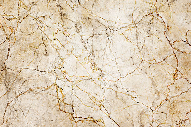 istock Marble stone texture background. Natural beige stone with dark veins. Elegant polished surface. 2218536298