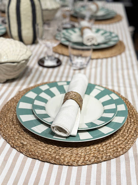 istock Image of elegant table setting, dinner plates, crockery, cutlery, tablecloth, napkins, placemats, dining table 2218536456
