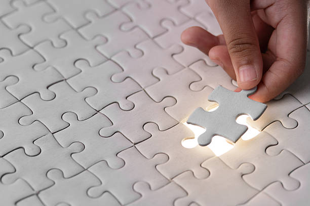 istock Piece of the puzzle is set,Light the way 2218539859