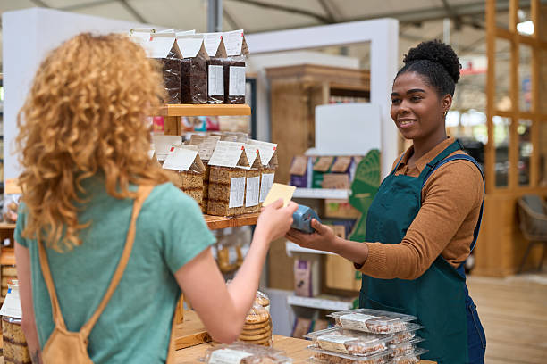 istock Customer paying with contactless payment in bakery shop 2218542303