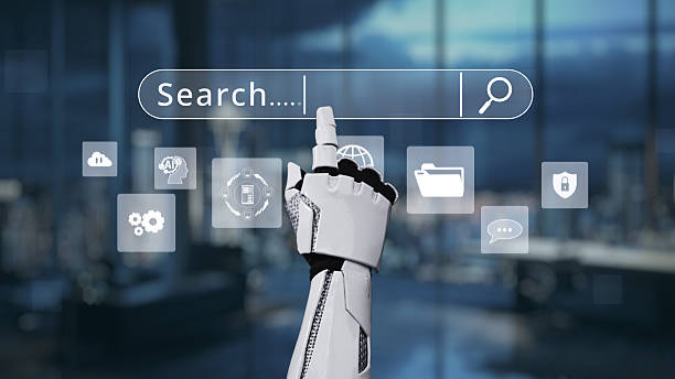 istock Futuristic robotic hand reaching for search bar with digital icons symbolizing technology, innovation, and artificial intelligence in a modern workspace. Auvana 2218543771