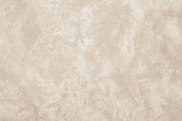 istock Colour old concrete wall texture background. Close up retro plain cream color cement wall background texture. Design paper vintage parchment element. 2218548137