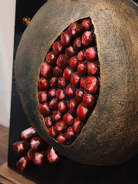 An Artistic Representation of a Pomegranate Displaying Its Seeds in a Creative Manner