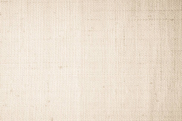 istock Brown sackcloth woven texture background in natural pattern. Jute hessian burlap, linen background in light beige cream color blank. Weaving canvas fiber line cotton cloth textured as organic. 2218549698