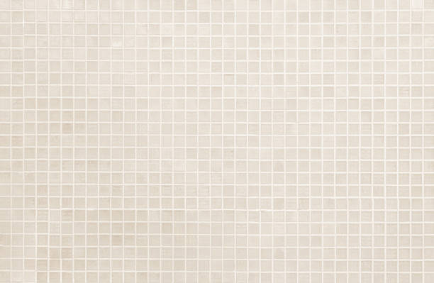 istock Cream light ceramic wall chequered and floor tiles mosaic background in bathroom, kitchen. Design pattern geometric with grid wallpaper texture decoration pool. Simple seamless abstract surface clean. 2218550658