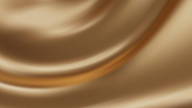 istock Realistic golden silk cloth texture. Smooth liquid gold waves. Elegant and luxurious background. 2218556717