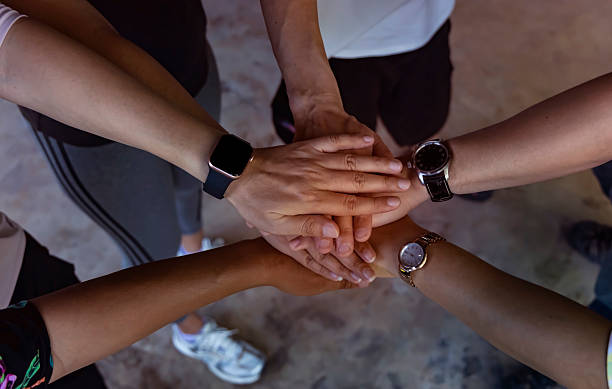 istock Teamwork Concept,Group of diversity people to greeting power tag team,Teamwork Join Hands Partnership Concept 2218561454