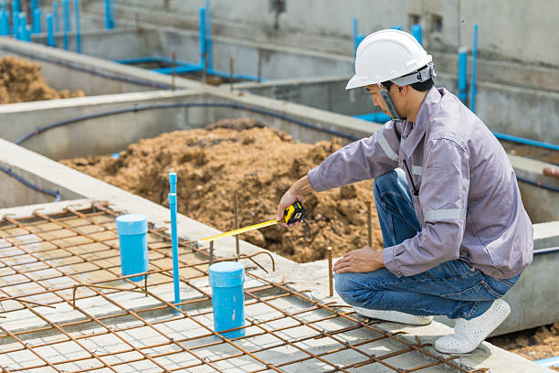 istock Asian construction engineer, Japanese builder worker male working inspecting footing house building. 2218565785