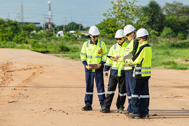 istock Engineer team project planning outdoor survey team, industry factory construction site. teamwork meeting . cooperation workers 2218565830
