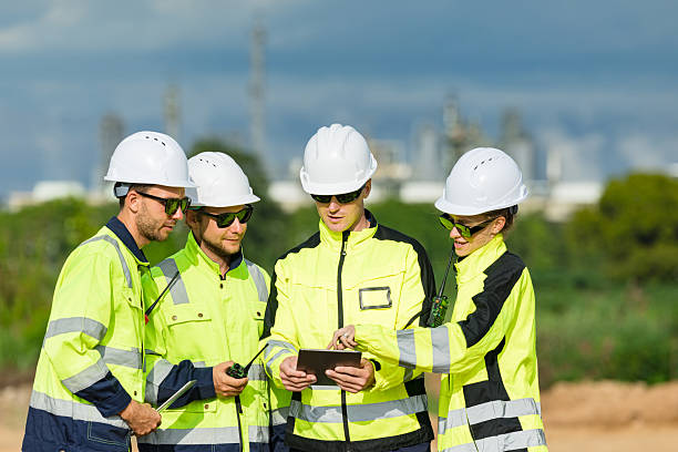 istock Engineer team project planning outdoor survey team, industry factory construction site. teamwork meeting . cooperation workers 2218565839