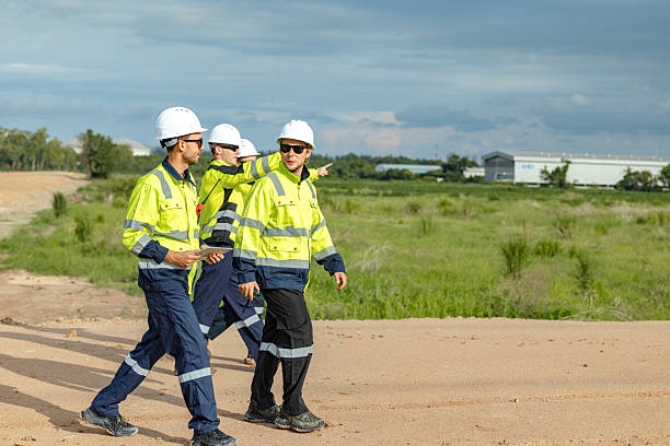 istock Engineer team project planning outdoor survey team, industry factory construction site. teamwork meeting . cooperation workers 2218565850
