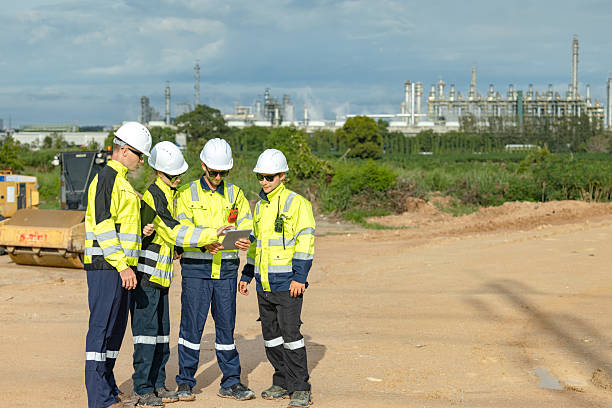 istock Engineer team project planning outdoor survey team, industry factory construction site. teamwork meeting . cooperation workers 2218565853
