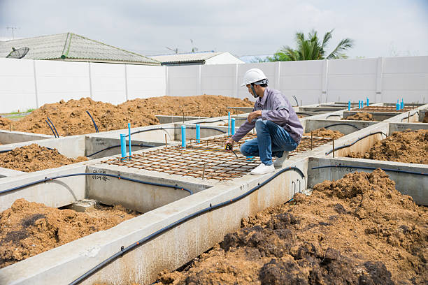 istock Asian construction engineer, Japanese builder worker male working inspecting footing house building. 2218565870