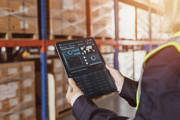 istock Staff worker using smart warehouse inventory management in tablet online tracking products shipping 2218566211