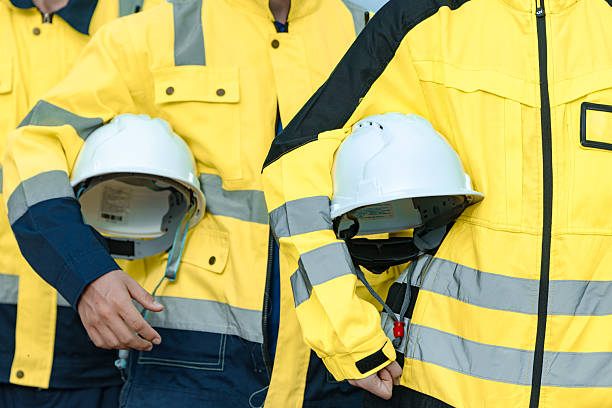 istock closeup safety equipment hardhat, engineer worker specialist expert team. professional skill worker standing confident 2218566245