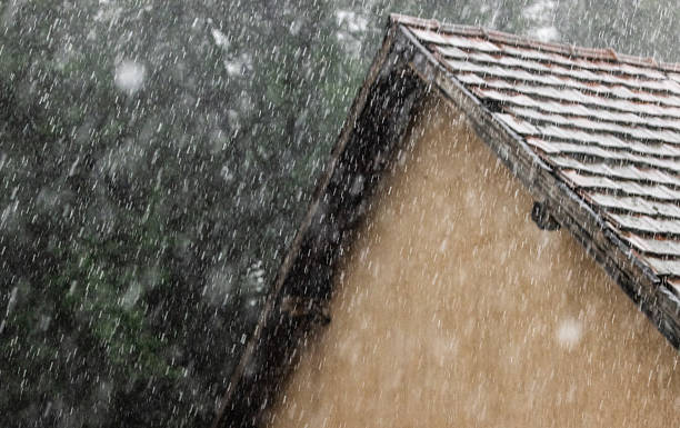 istock Tiled roof under very heavy rain 2218579175