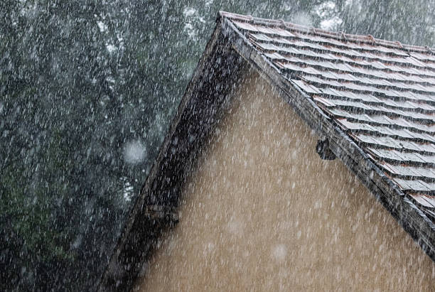 istock Tiled roof under very heavy rain 2218579176