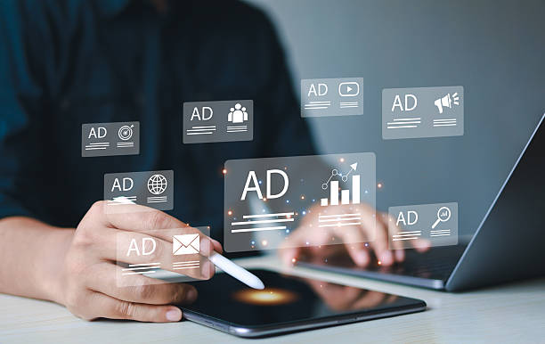 istock Advertising and digital marketing analytics concept. Businessman using laptop with advertising dashboard. Digital marketing strategy analysis for branding, online advertising, website and social media advertising. 2218581784
