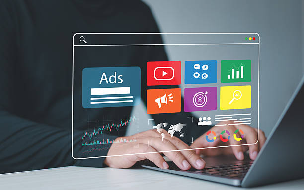 istock Advertising and digital marketing analytics concept. Businessman using laptop with advertising dashboard. Digital marketing strategy analysis for branding, online advertising, website and social media advertising. 2218581786