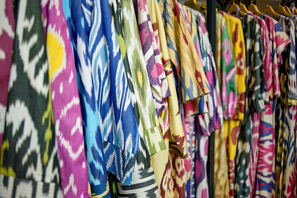 istock traditional Uzbek ikat robes 2218587427
