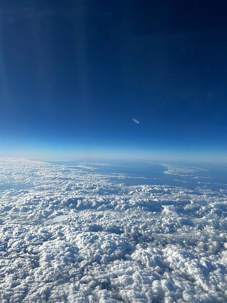 istock Aerial view of clouds under a deep blue sky. 2218588781