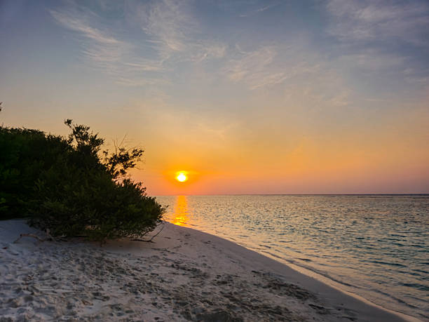 Sunset over the sea in Maldives.