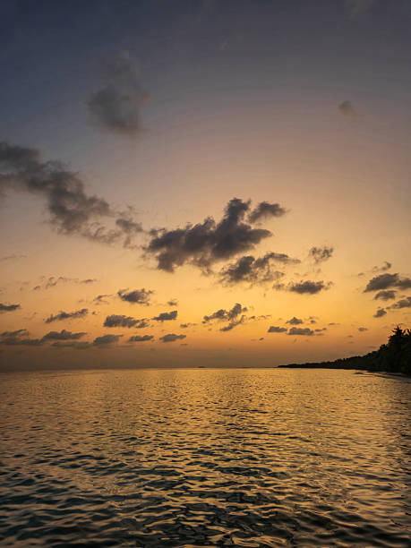 Sunset over the sea in Maldives.