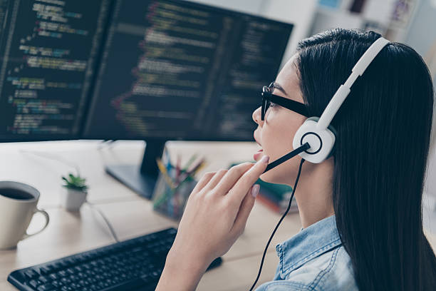 istock Profile side view portrait of attractive skilled long-haired girl editing database answering call consulting at workplace workstation indoors 2218594887