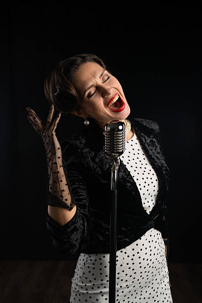 istock Elegant Woman Singing in Retro Style with a Passionate Expression 2218595479