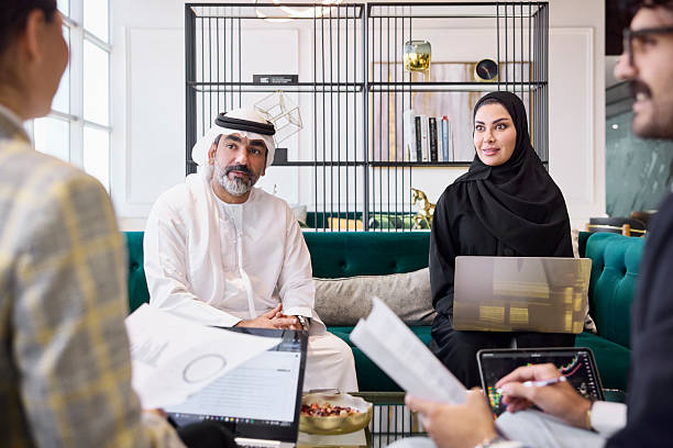 istock Arab entrepreneurs listening to colleague explaining report 2218600264