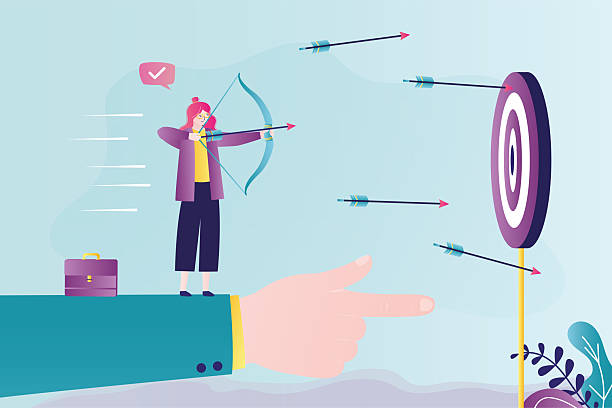 istock Businesswoman aiming at target with bow and arrow. Successful hitting target. Mentor points right way for shooting arrow at bullseye. Big helping hand 2218606864