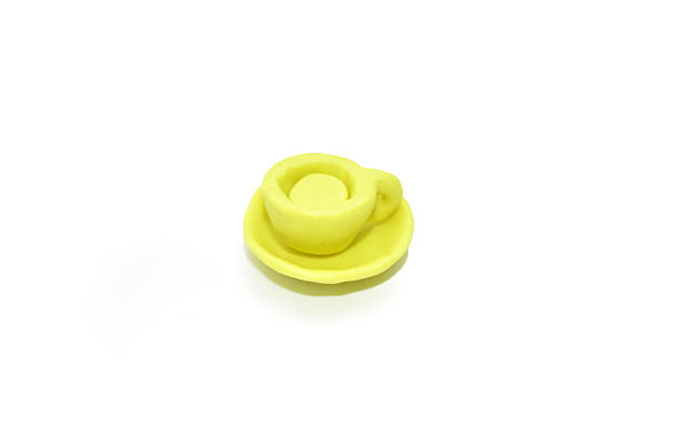 istock small yellow cartoon plasticine cup 2218608597