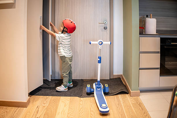 istock Boy preparing to go outdoors 2218609757