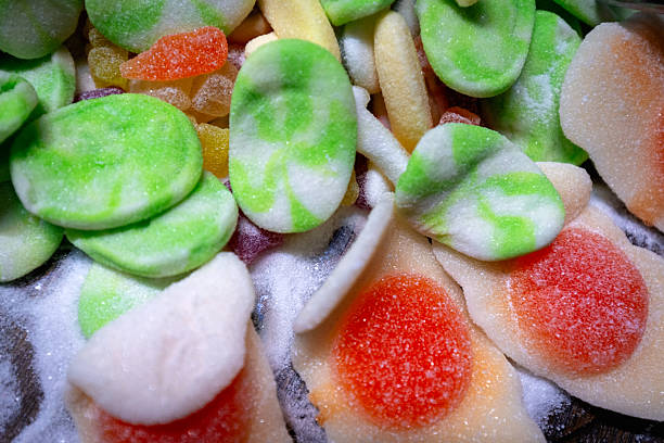 Vibrant colorful fried egg gummy candies, satisfying texture, they make the most visually appealing treat.
