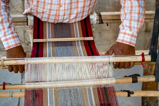 View on silk loom in workshop in Ambalavao, which is famous for it's thick silk material. Madagascar