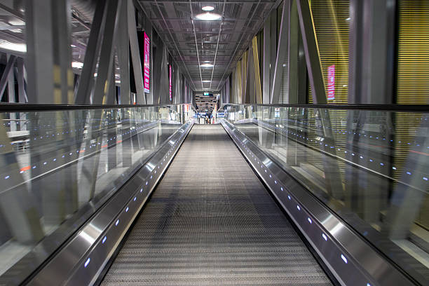 istock A ride on moving walkway inside a tunnel 2218625551