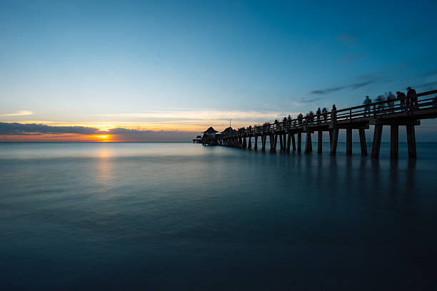 istock Tourists walking on Naples Pier at sunset, Florida 2218628927
