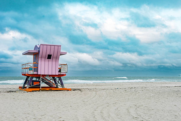 istock Colorful lifeguard tower standing on Miami Beach under a cloudy sky 2218630574