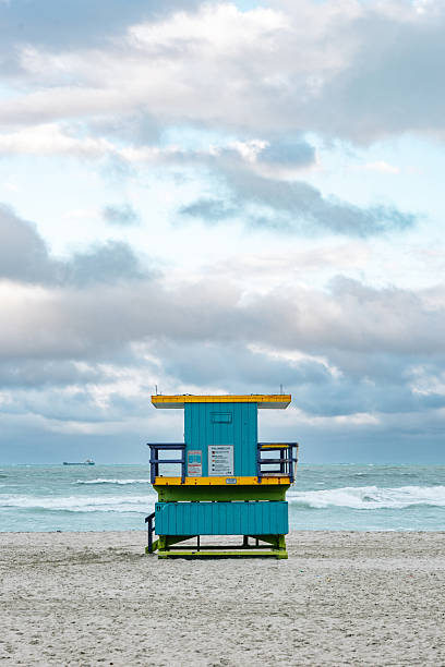 istock Lifeguard tower standing on Miami Beach under a cloudy sky 2218630587