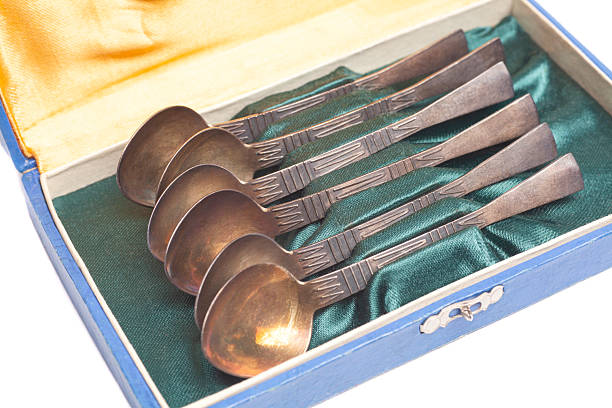 Antique cutlery teaspoons in box.