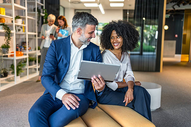 istock Business colleagues sharing ideas and working on digital tablet in modern office 2218632260