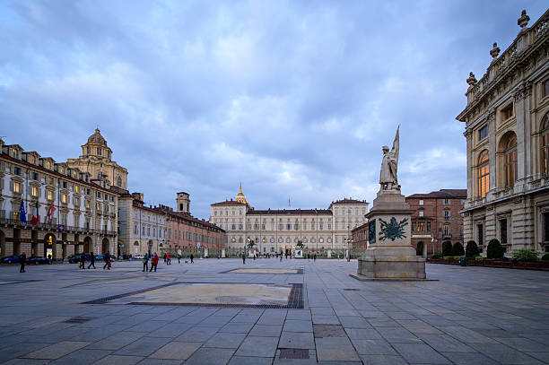 Turin, Italy - December 1, 2021: Evening stroll through Piazza Castello in Turin with historical architecture and calm ambiance