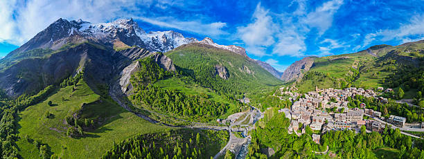Aerial flyover above the Village of La Grave France in the Ecrins Mountains in the the French Alps
