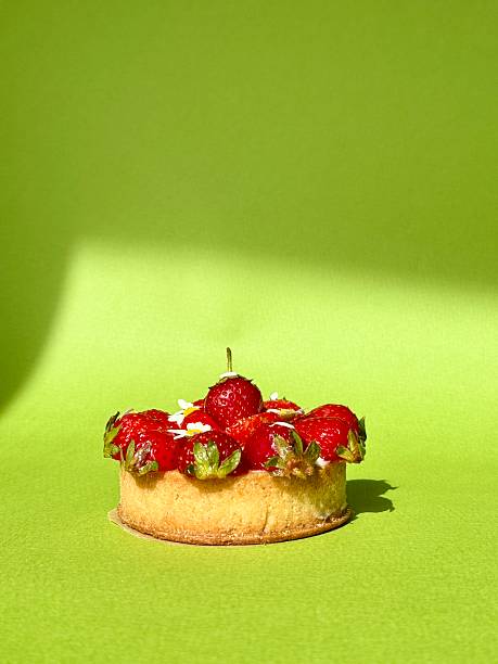Strawberry Tart with Fresh Fruit and Delicate Floral Garnish. High quality photo